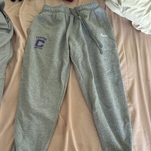 Nike Kids Gray Joggers with Purple Logo